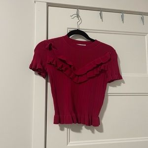 Magenta knit crop top with ruffle detail